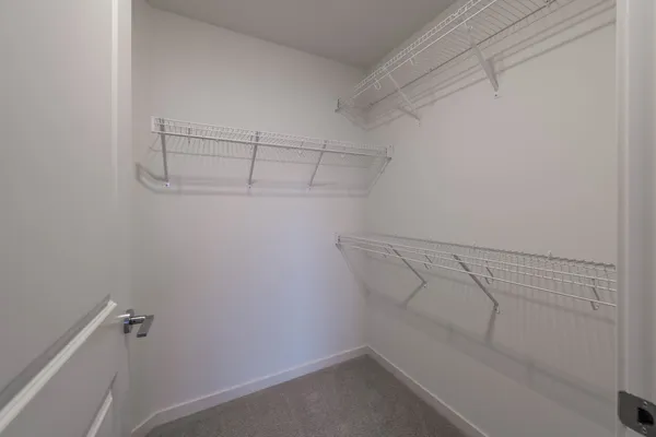 a view of a room with racks on the wall