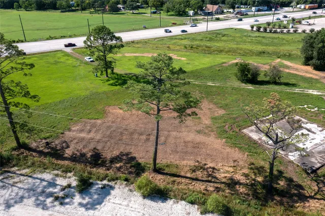 a view of a golf course with a bench
