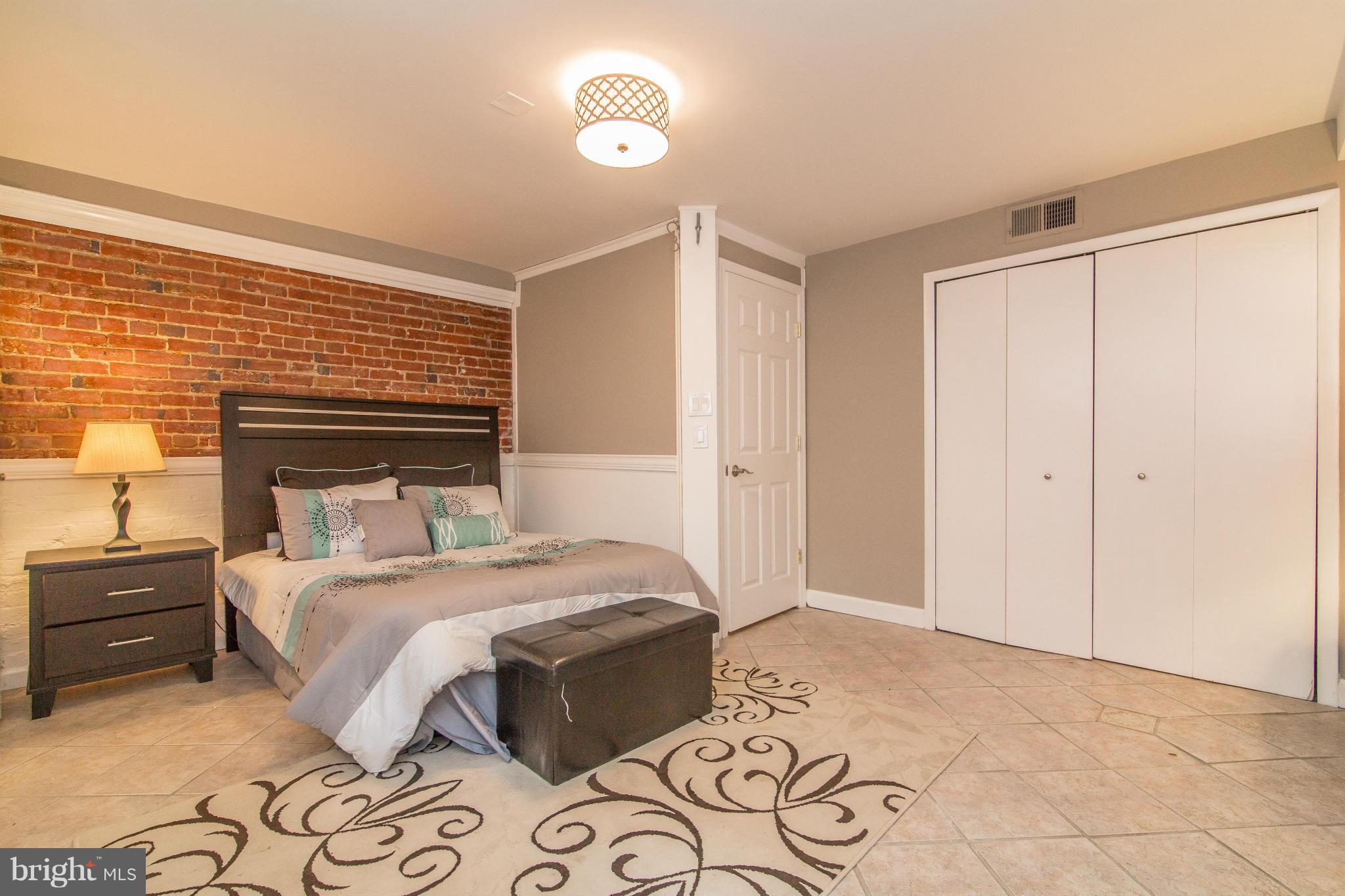 1806 Riggs Place Northwest, Unit 1 Washington, DC 20009 - Photo 11 of 21 Spacious Master Bedroom