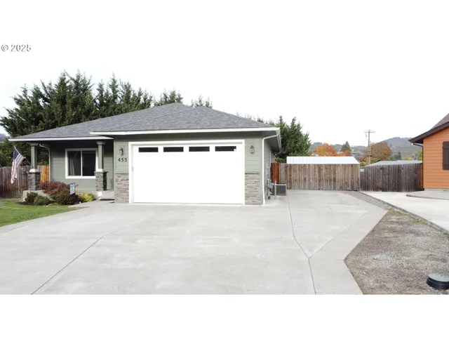a black and white photo of a house