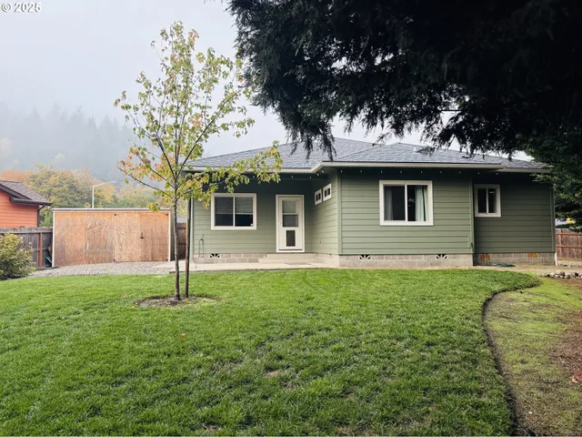 a house view with a garden space