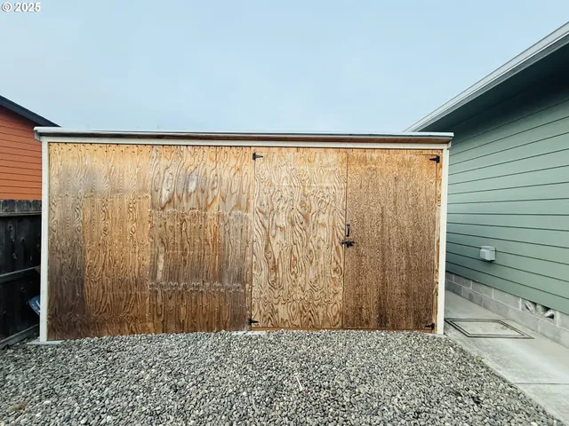 a view of a room with a window and a shower