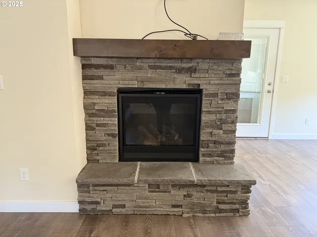 a living room with fireplace