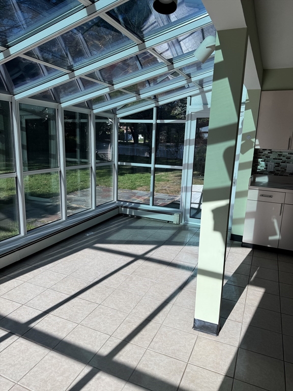 793 Dedham Street Newton, MA 02459 - Photo 11 of 26 a house with garden in the background