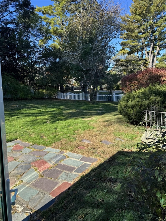 793 Dedham Street Newton, MA 02459 - Photo 12 of 26 a view of a swimming pool with a yard