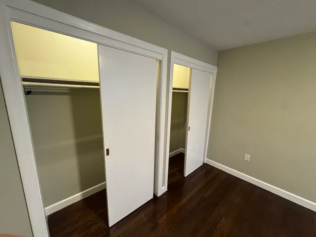 a bathroom with a shower and a sink