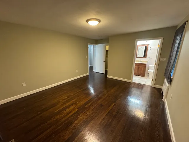 a kitchen with stainless steel appliances granite countertop a stove and a refrigerator