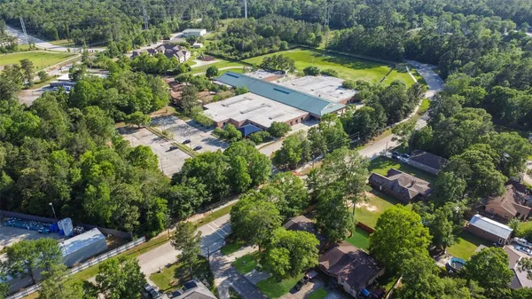 an aerial view of a house with a garden