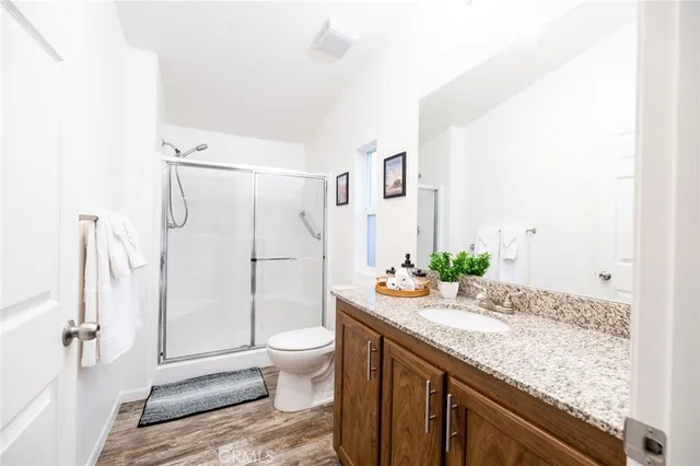 a view of a yard with large trees