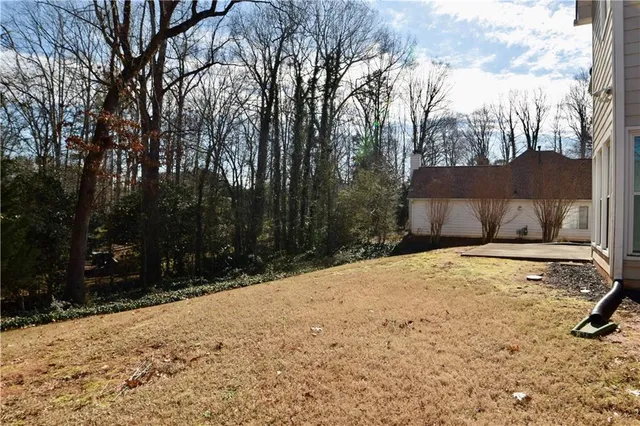 a house with trees in front of it