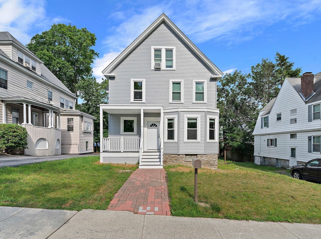 10 Trowbridge Road Worcester, MA 01609 - Photo 2 of 38 a front view of a house with a yard