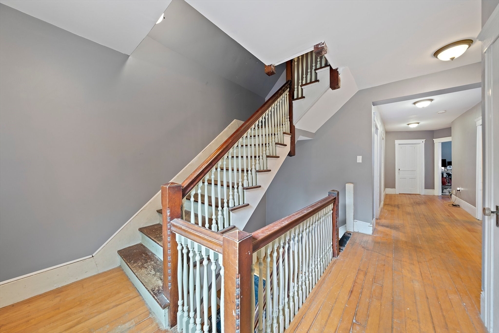 10 Trowbridge Road Worcester, MA 01609 - Photo 21 of 38 a view of staircase with wooden floor and fan