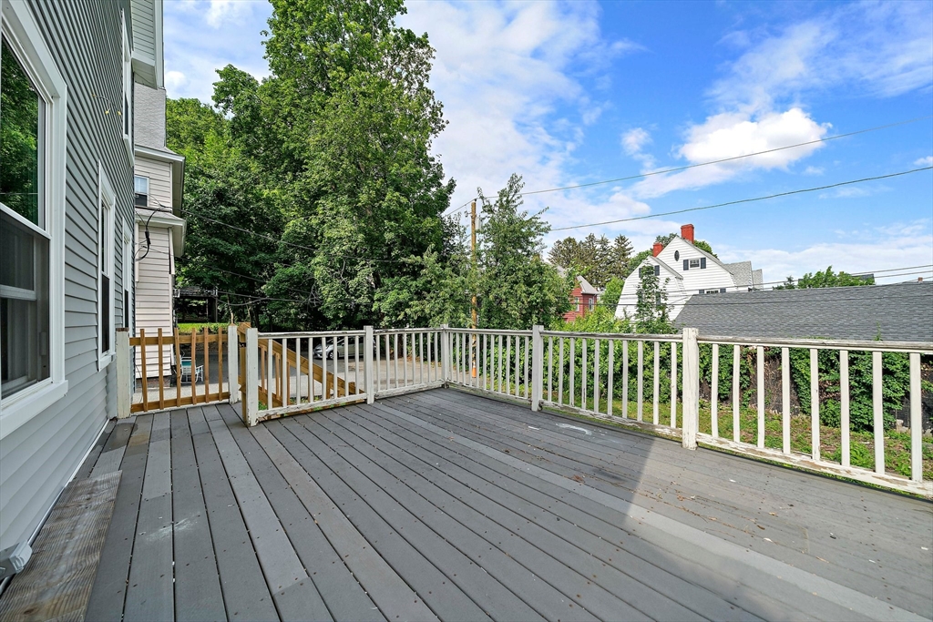 10 Trowbridge Road Worcester, MA 01609 - Photo 31 of 38 a view of deck with wooden floor and fence