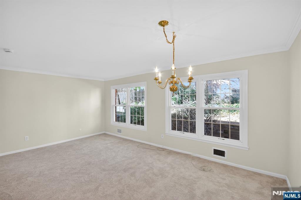 260 Prospect Street, Unit 12 Westfield, NJ 07090 - Photo 3 of 14 a view of an empty room with a window