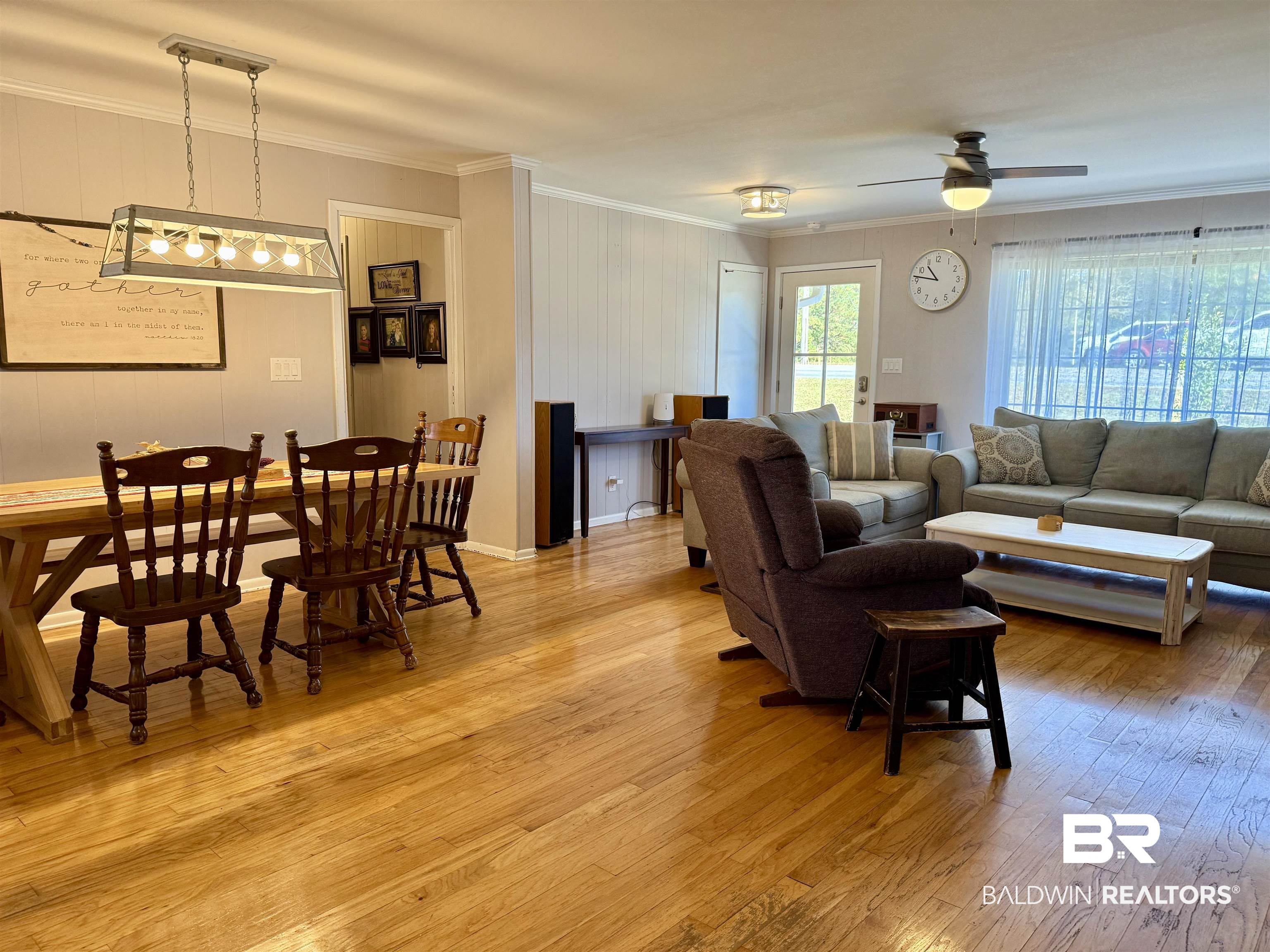 2785 Appleton Road Brewton, AL 36426 - Photo 3 of 28 Living area with ornamental molding, light wood-style floors, and a ceiling fan