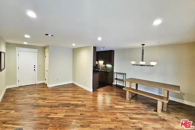 a view of a livingroom with a kitchen