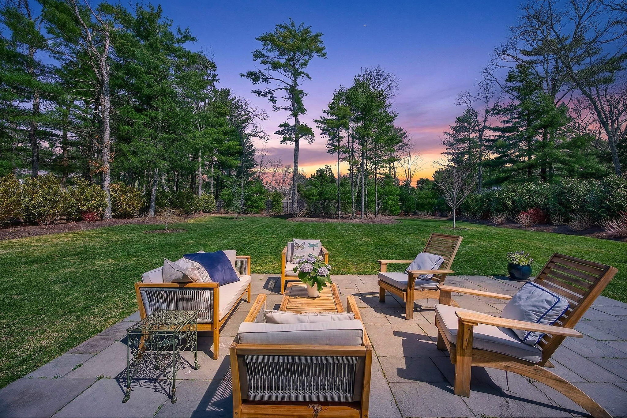 176 Bumps River Road Osterville, MA 02655 - Photo 2 of 54 a view of a patio with couches chairs and a big yard