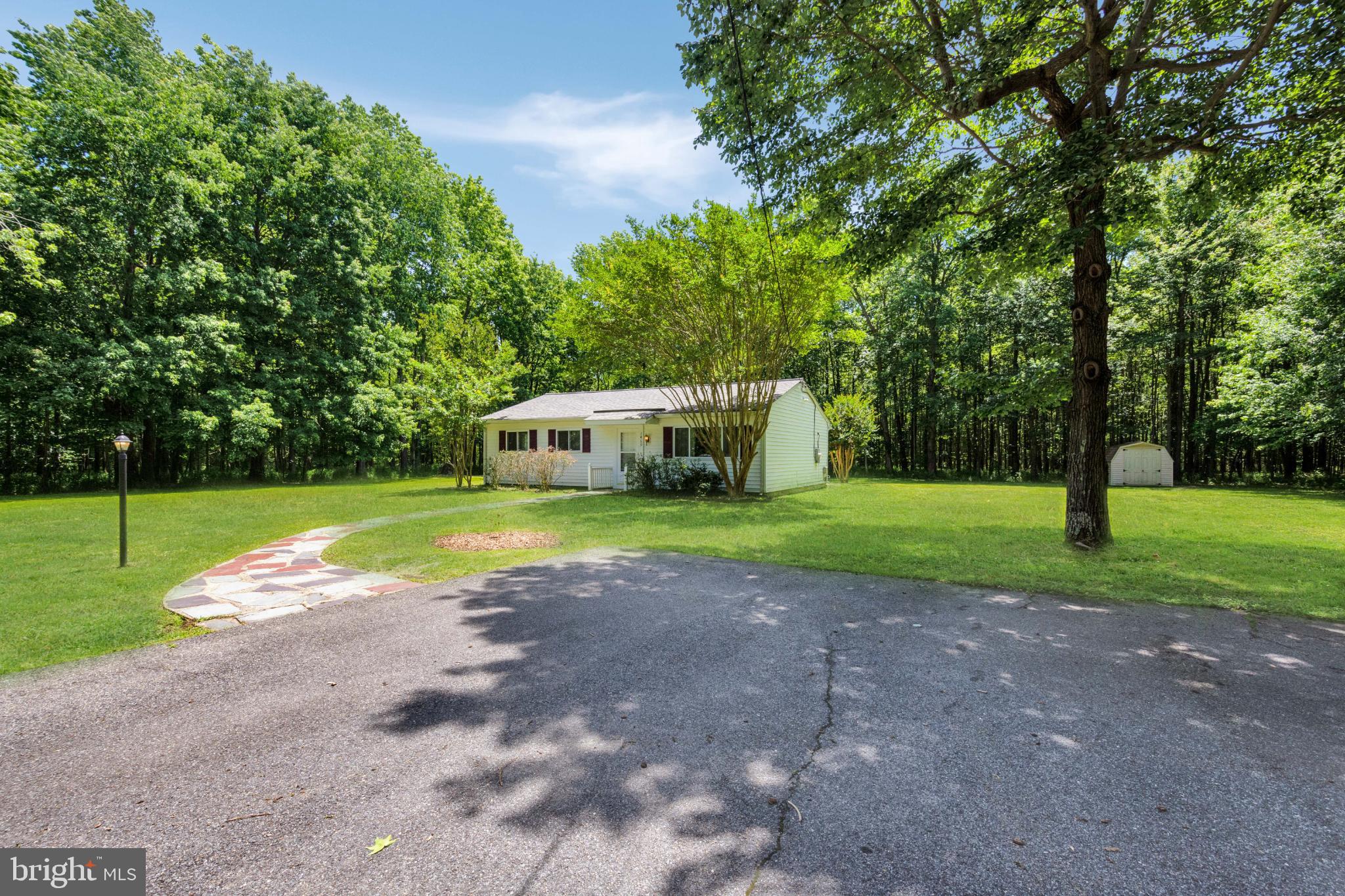 Charming home nestled in lush greenery.