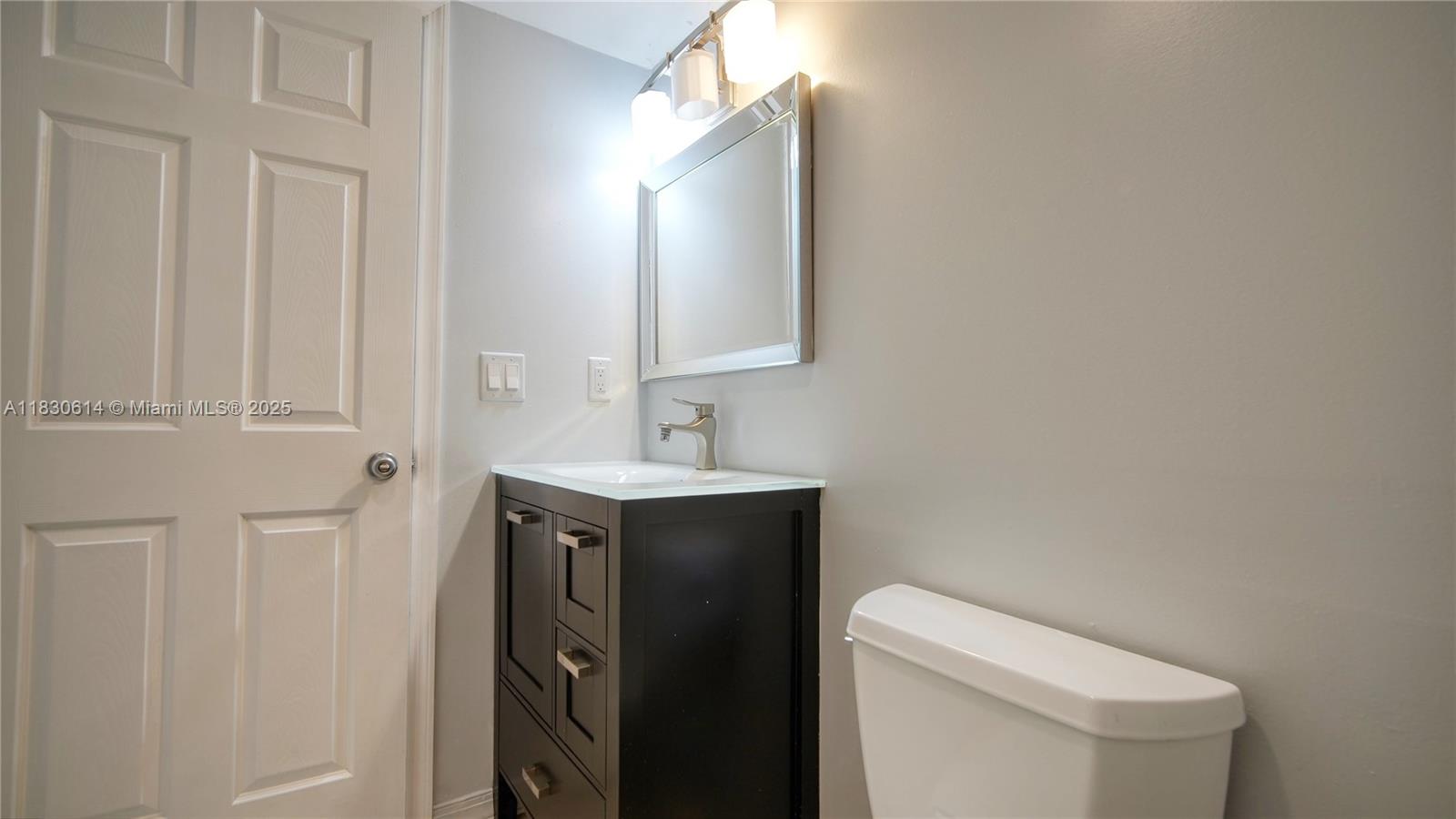 11101 Southwest 15th Manor, Unit 11101 Davie, FL 33324 - Photo 17 of 44 Half bath downstairs