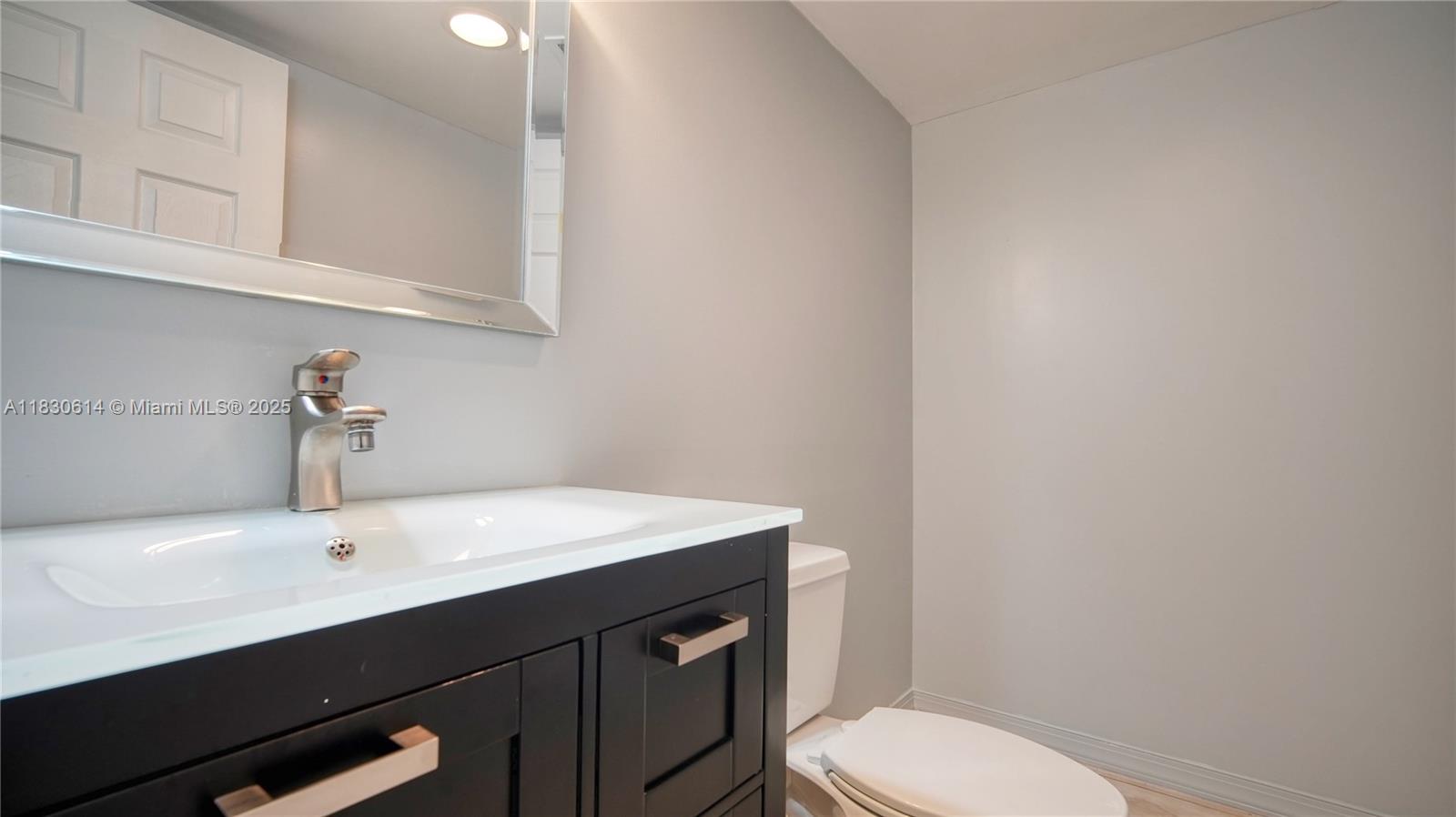 11101 Southwest 15th Manor, Unit 11101 Davie, FL 33324 - Photo 18 of 44 Half bath downstairs