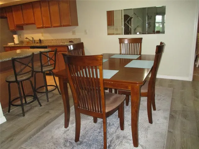 a view of a dining room with furniture
