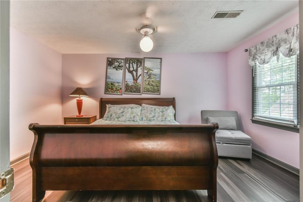 591 Rue Cezzan Lavonia, GA 30553 - Photo 20 of 36 a bedroom with a bed and window