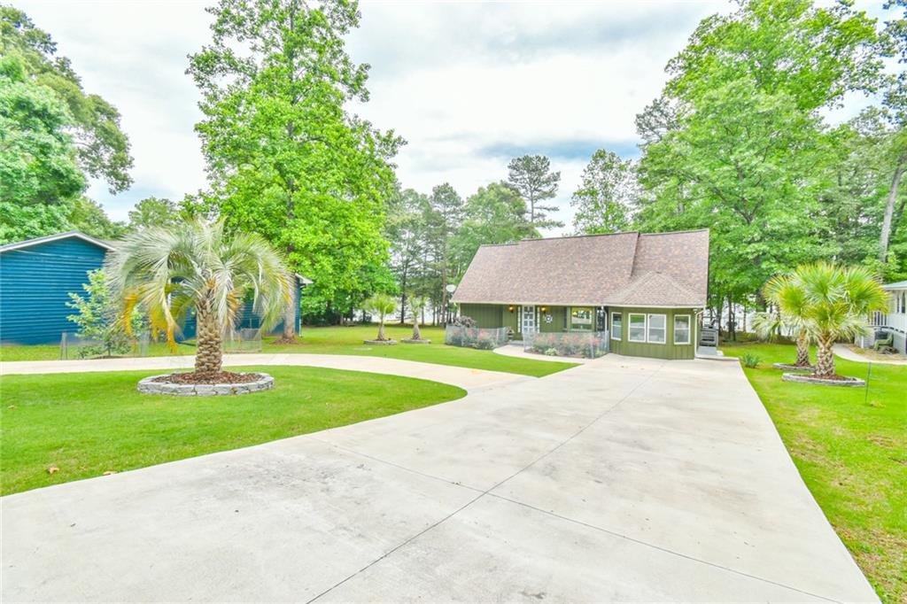 591 Rue Cezzan Lavonia, GA 30553 - Photo 30 of 36 a view of a house with a yard