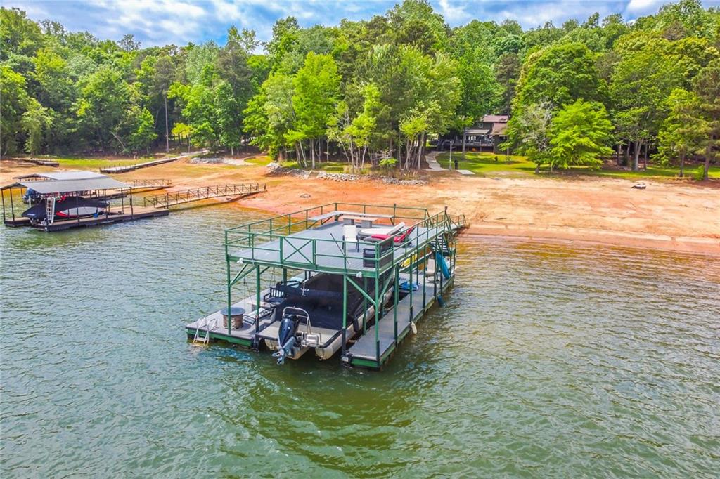 591 Rue Cezzan Lavonia, GA 30553 - Photo 33 of 36 a view of a lake with outdoor space