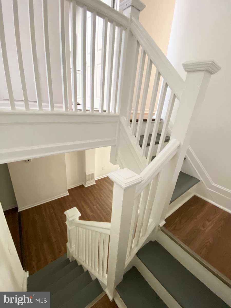 3015 Rayner Avenue Baltimore, MD 21216 - Photo 22 of 71 a view of entryway with wooden floor