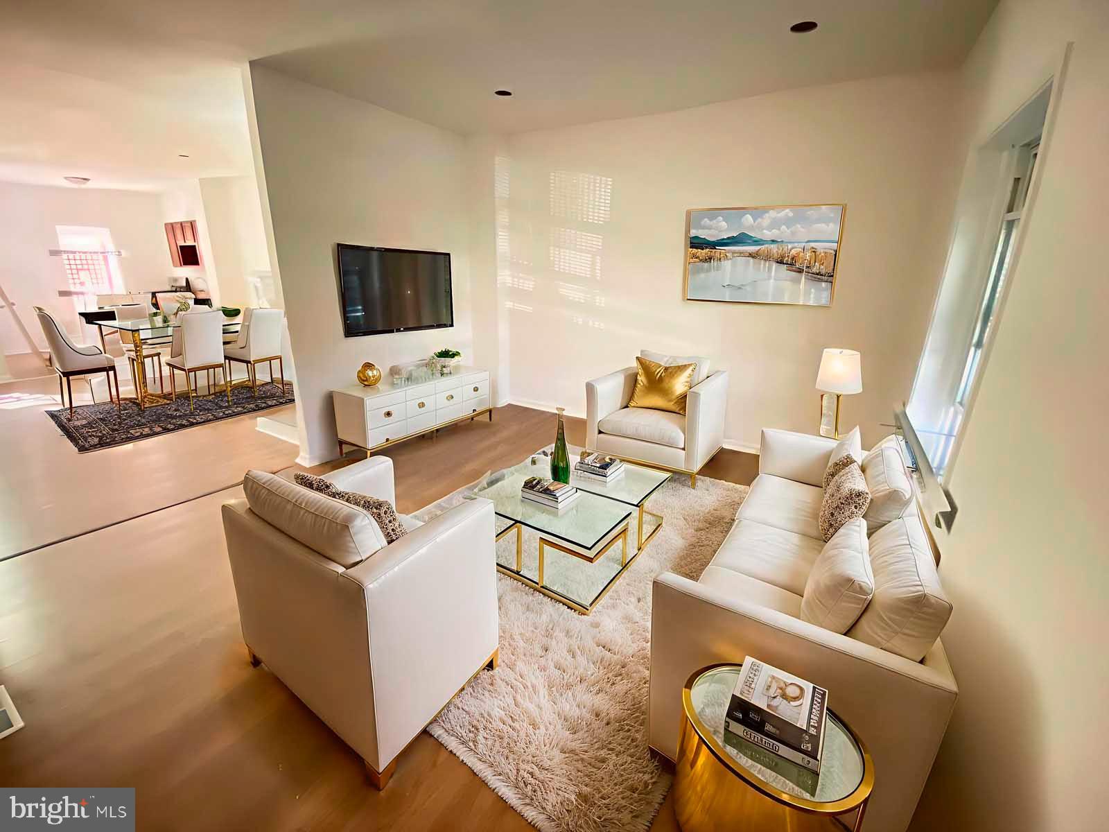 3015 Rayner Avenue Baltimore, MD 21216 - Photo 23 of 71 a living room with furniture and a flat screen tv