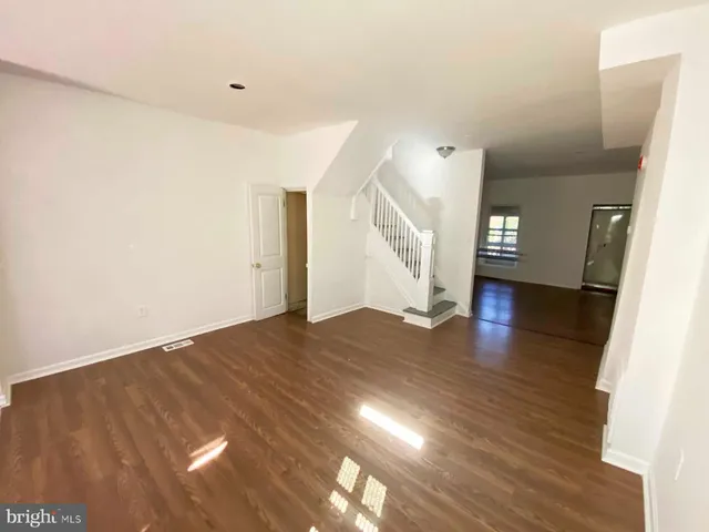 a kitchen with stainless steel appliances granite countertop a stove and a microwave
