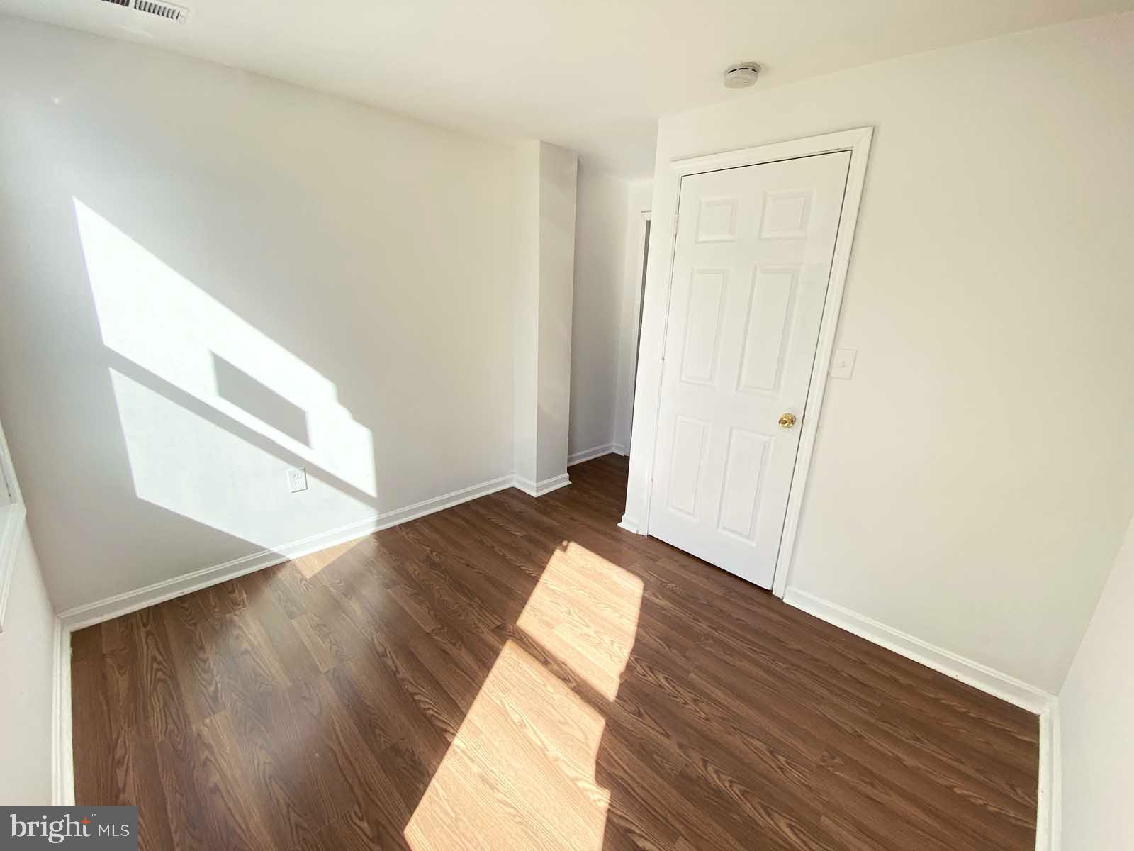 3015 Rayner Avenue Baltimore, MD 21216 - Photo 3 of 71 a view of entryway with wooden floor