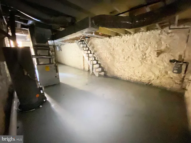 a view of a backyard of the house