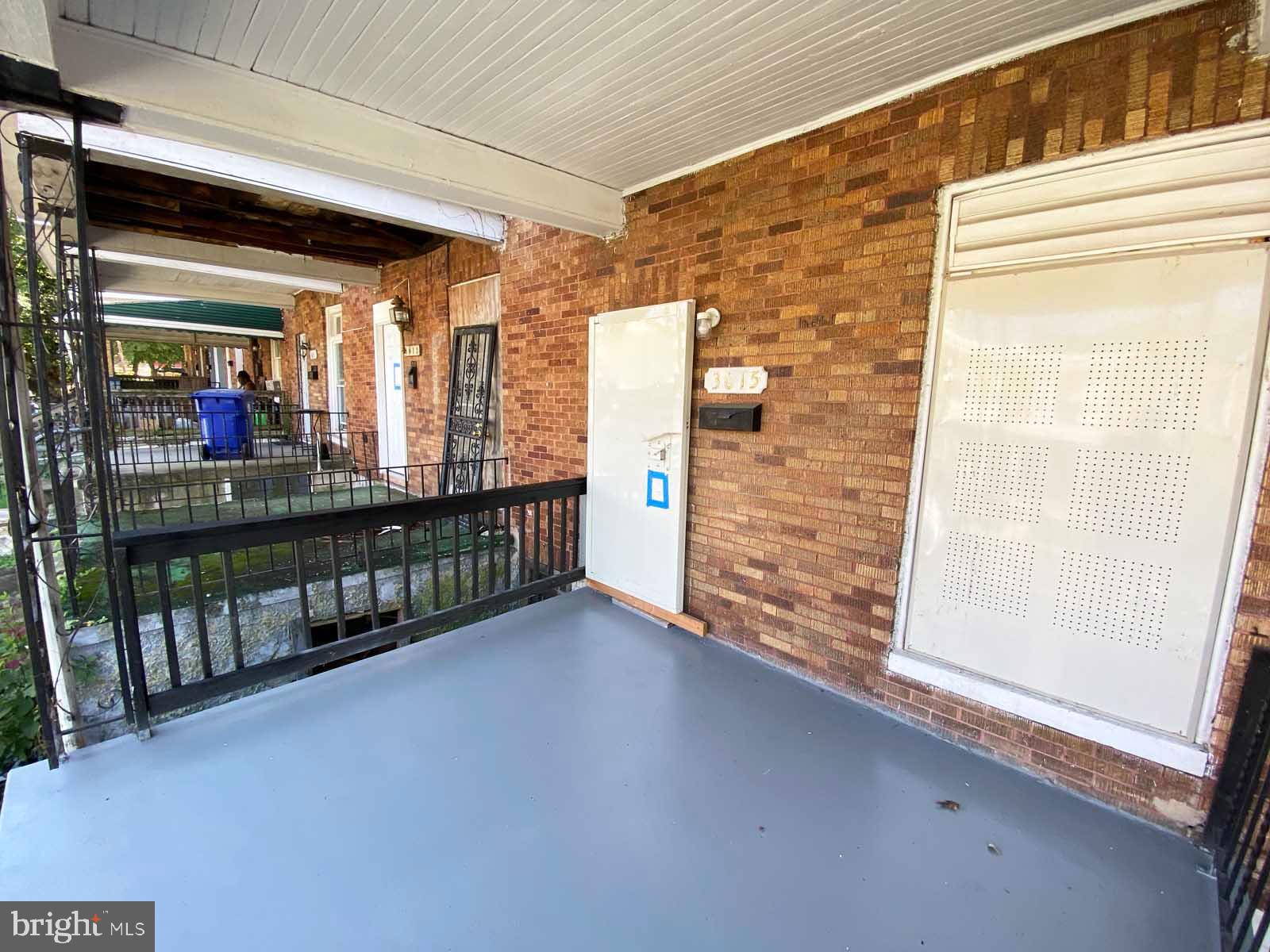 3015 Rayner Avenue Baltimore, MD 21216 - Photo 63 of 71 a view of a porch with wooden floor and outdoor space