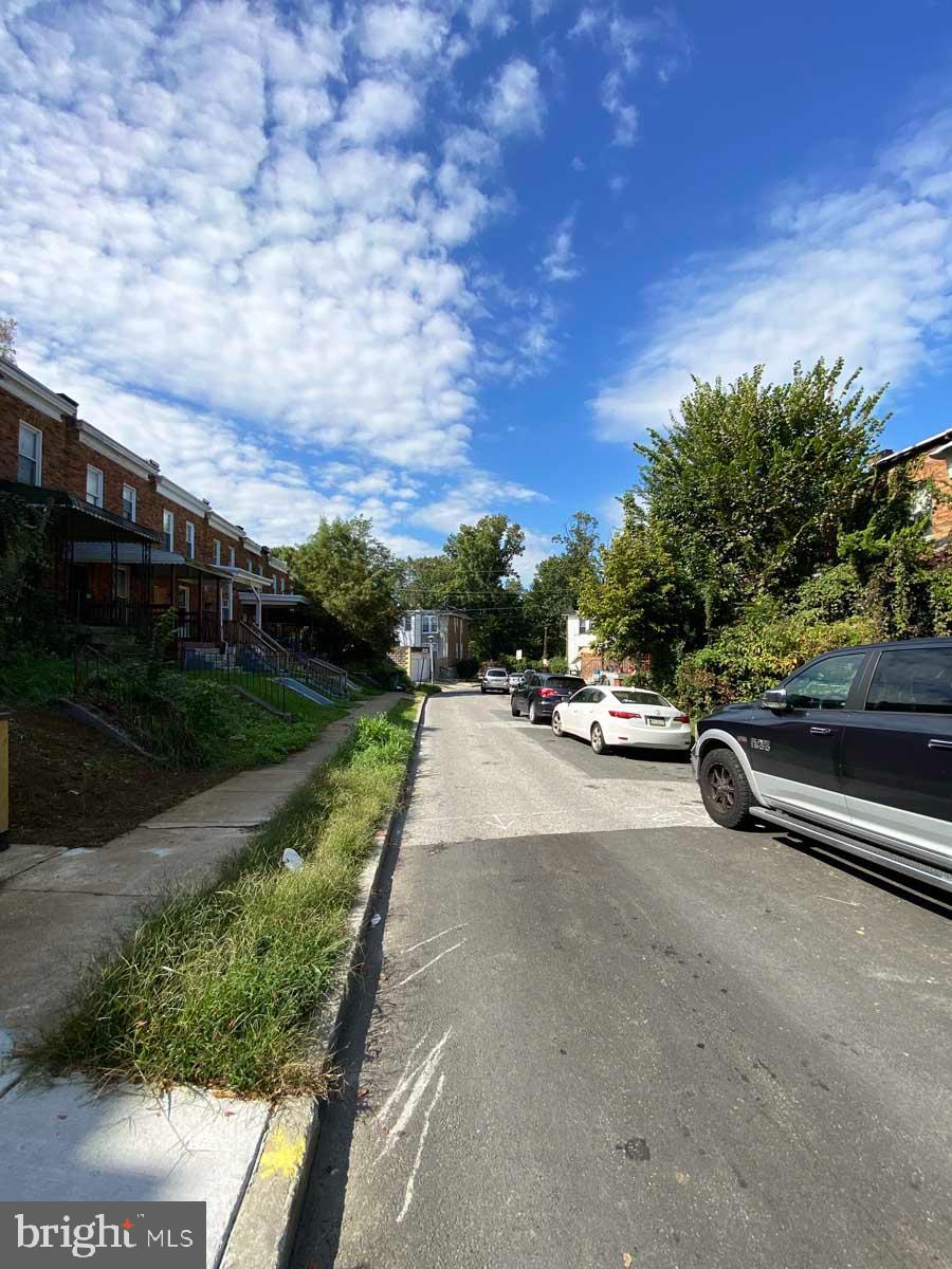3015 Rayner Avenue Baltimore, MD 21216 - Photo 71 of 71 a view of street with parked cars