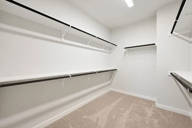 a view of a room with racks on the wall