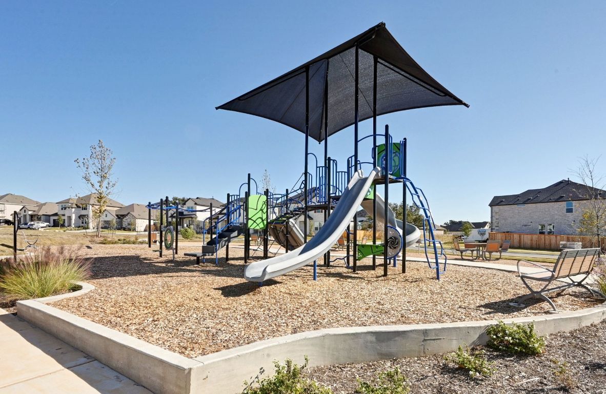 144 Granit Oak Drive Dripping Springs, TX 78620 - Photo 27 of 33 a view of a park with a slide