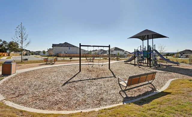 a view of a street with a building in front of it