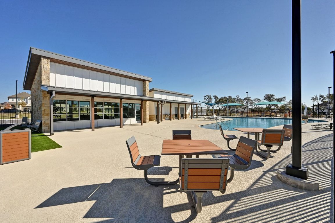 144 Granit Oak Drive Dripping Springs, TX 78620 - Photo 32 of 33 a balcony with furniture and city view