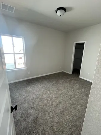 an empty room with a window