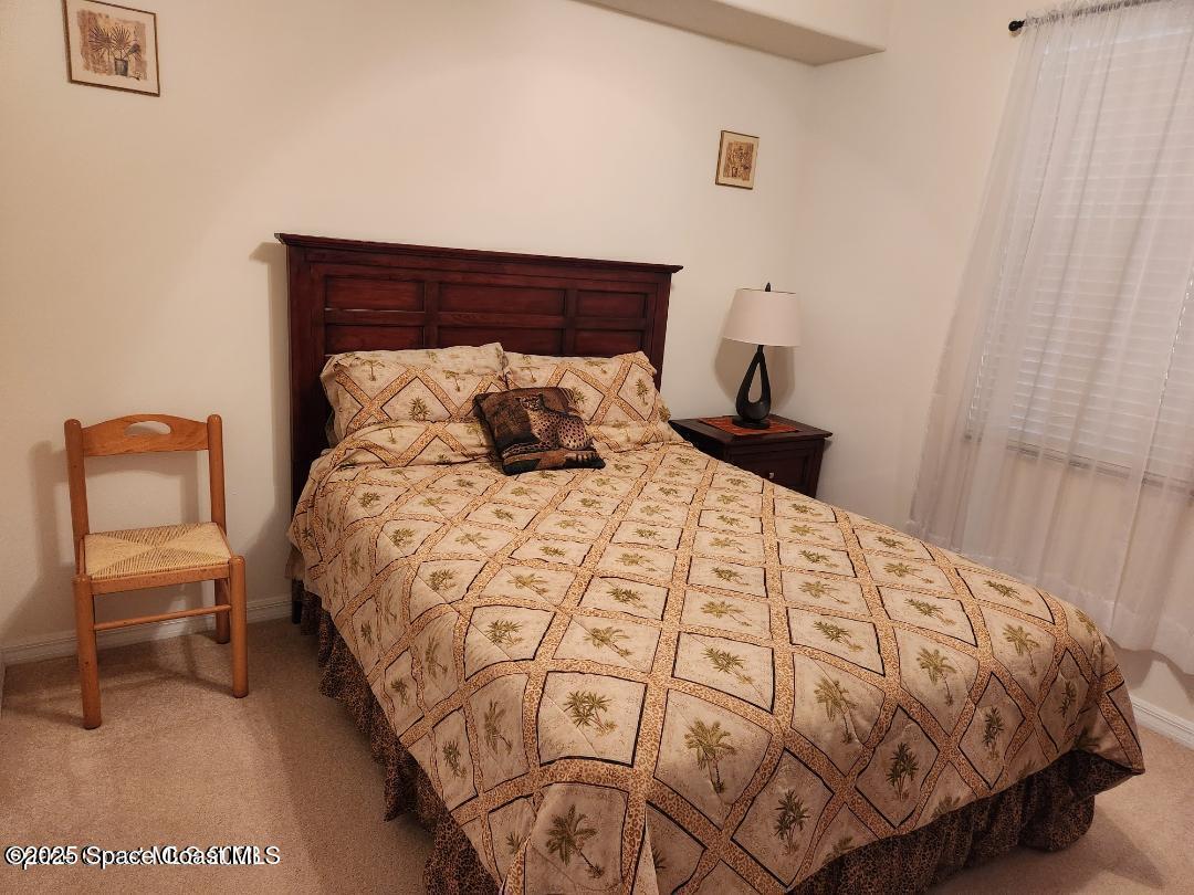 6858 Toland Drive, Unit 304 Melbourne, FL 32940 - Photo 19 of 31 2nd Bedroom