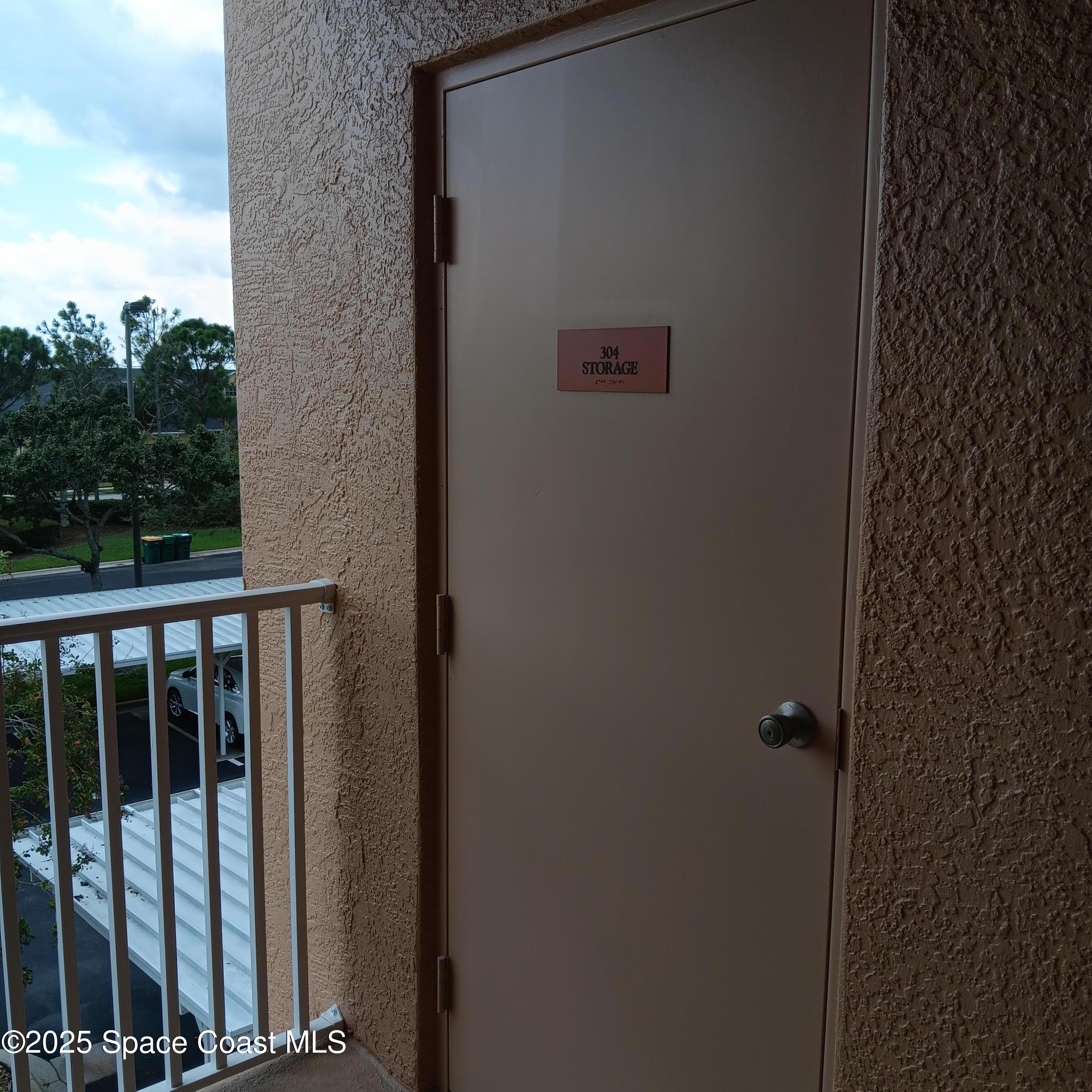 6858 Toland Drive, Unit 304 Melbourne, FL 32940 - Photo 26 of 31 a view of balcony