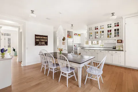 a kitchen with stainless steel appliances granite countertop a sink and stove