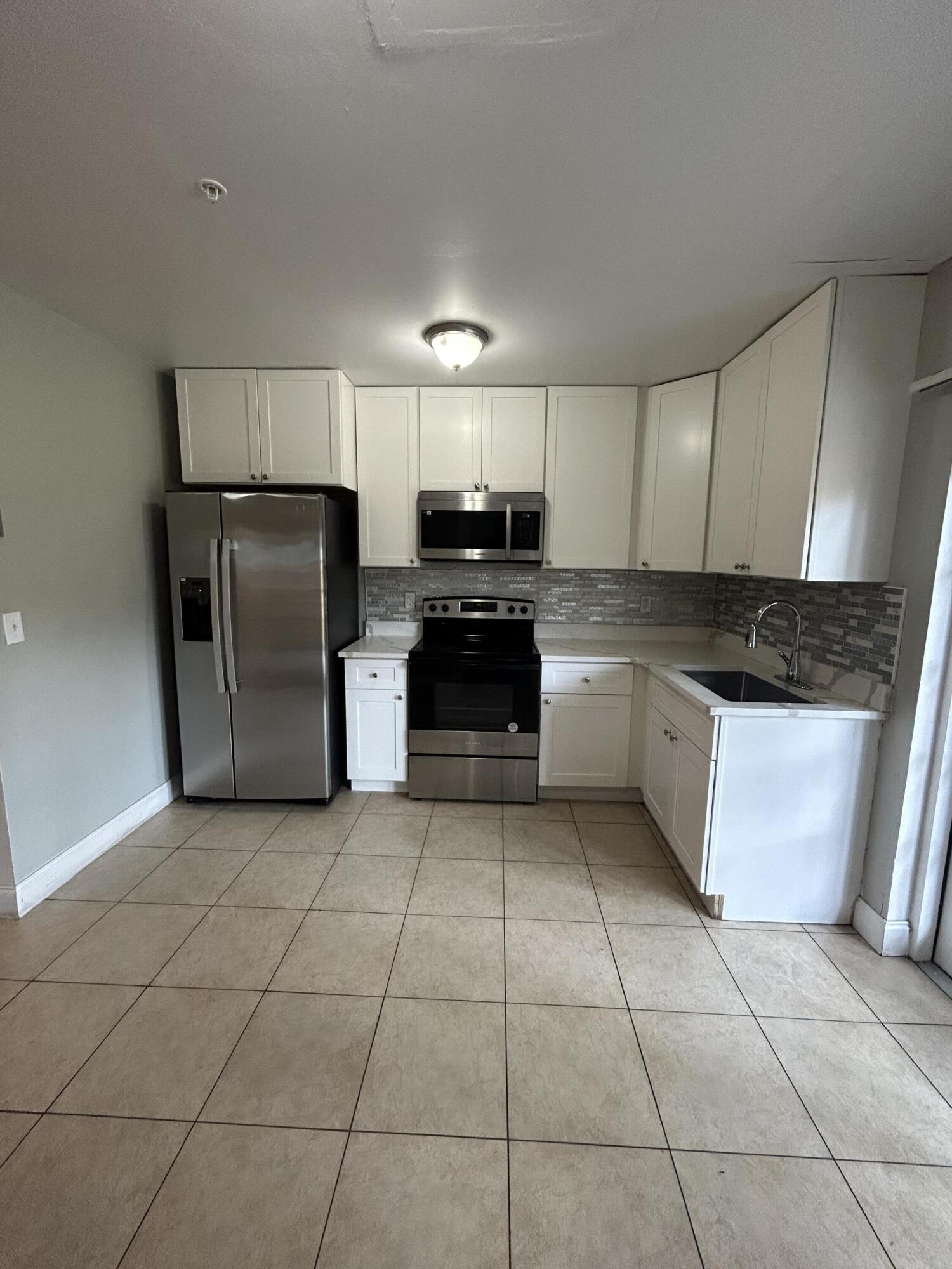 3045 Jackson Avenue Greenacres, FL 33463 - Photo 6 of 16 IMG_7519