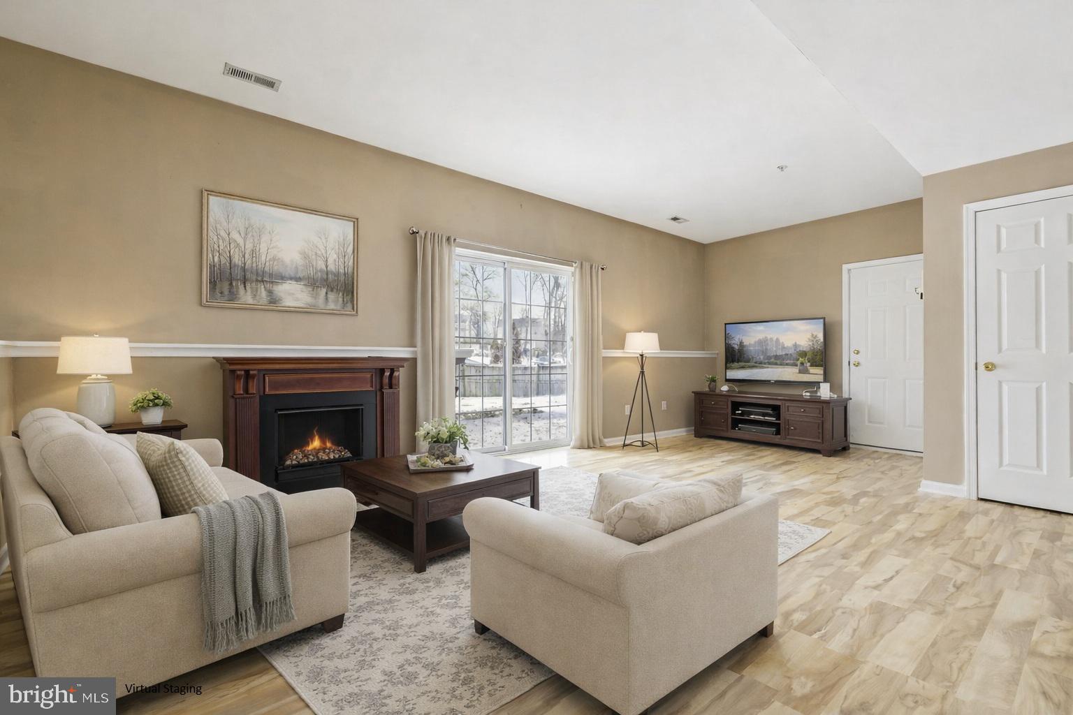 423 Red Pump Road Bel Air, MD 21014 - Photo 26 of 28 a living room with furniture and a fireplace
