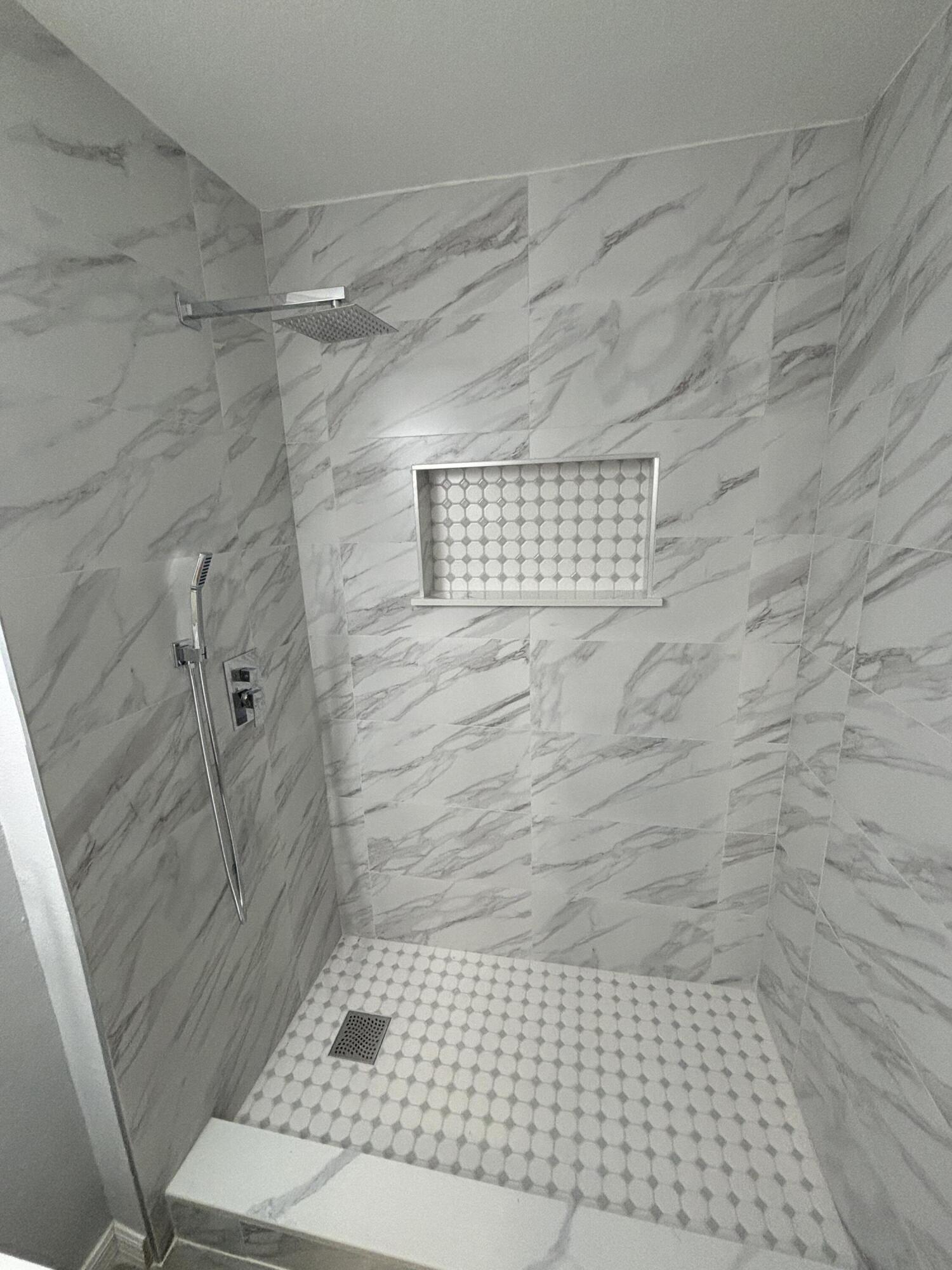 4305 Hammock Trail Mims, FL 32754 - Photo 11 of 16 a bathroom with a shower