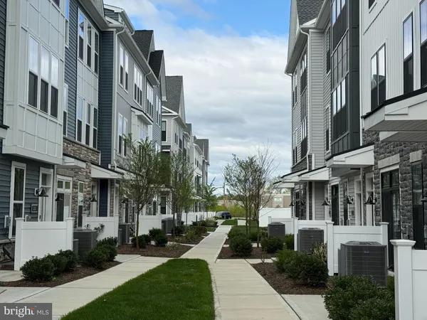 a view of a building with a yard