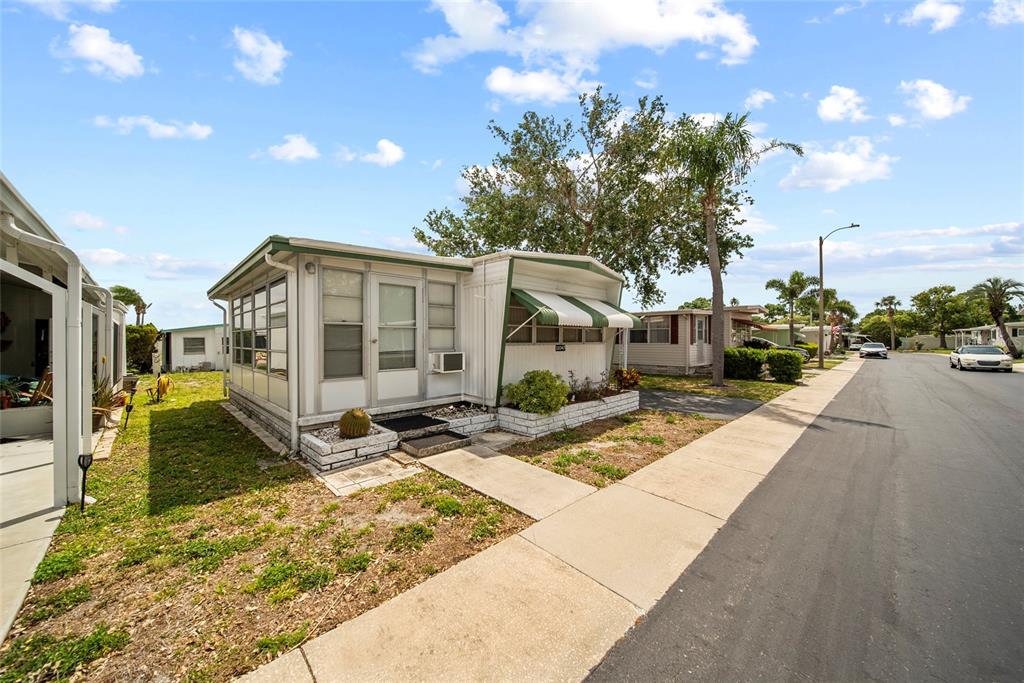 11047 102nd Way North, Unit 203 Largo, FL 33773 - Photo 14 of 26 a view of a house with backyard