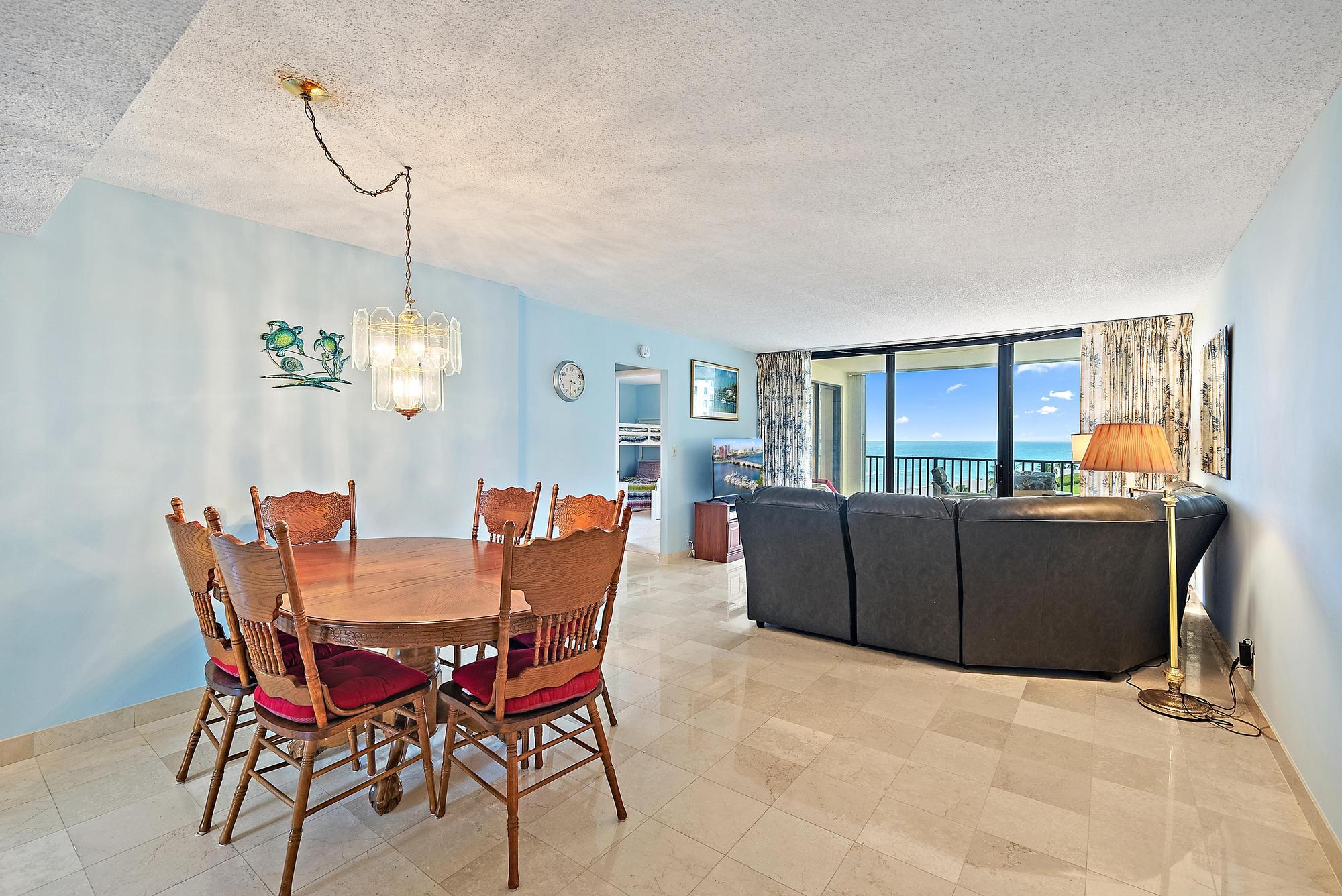 400 Ocean Trail Way, Unit 601 Jupiter, FL 33477 - Photo 23 of 42 a view of a dining room with furniture