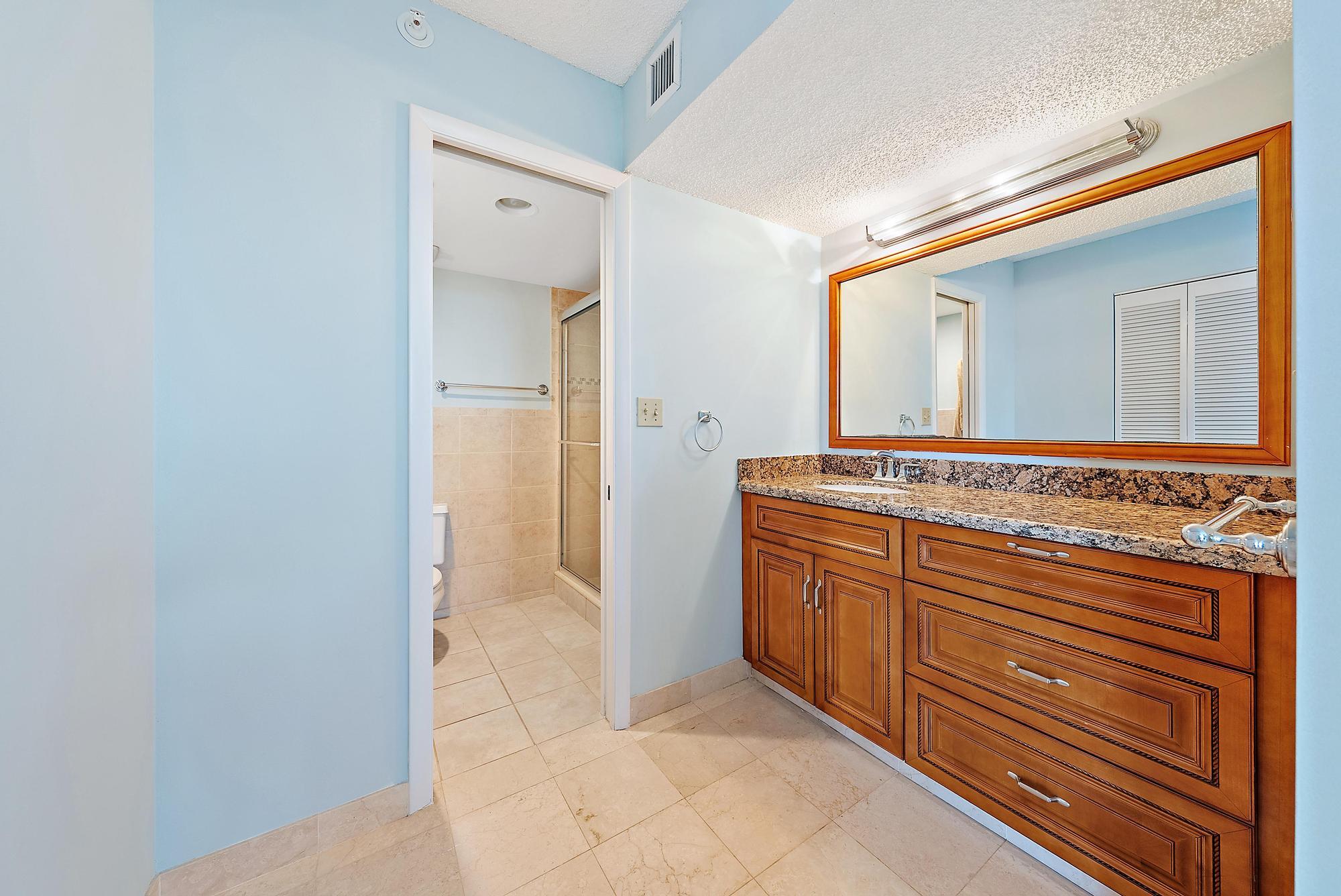 400 Ocean Trail Way, Unit 601 Jupiter, FL 33477 - Photo 28 of 42 a view of a hallway with closet